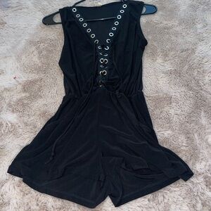 Black Sleeveless Jumpsuit with V-Neck and Eyelet Detail
